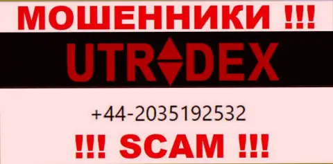 У UTradex далеко не один номер телефона, с какого будут названивать неведомо, осторожнее